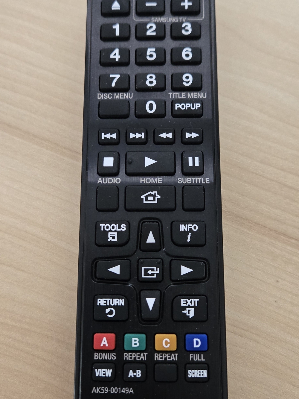 Samsung Black TV Remote with Multi-Color Function Buttons